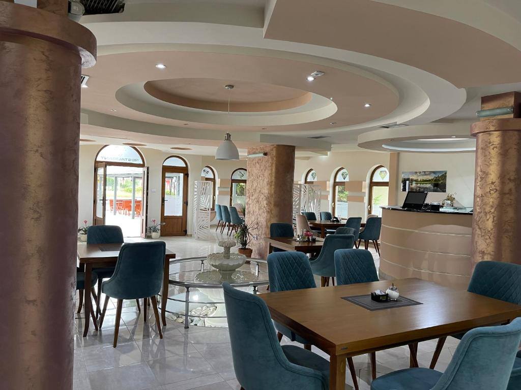 Reception and dining area of Rooms5E hotel in Plav