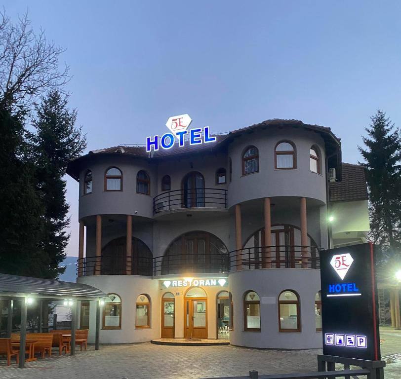Rooms5E hotel building in Plav, Montenegro at dusk